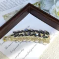 Crystal banana hair clip detailed view, elegant black rhinestone vertical accessory. - Wheat Grey