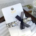 Elegant black bow rhinestone pearl hair clip sweet side clip for charming daily hairstyles. - Plum Blossom Pearl Style in Iridescent White