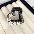 Elegant black heart hair claw clip with white flowers and sparkly rhinestones for charming styling. - Heart Style / Black