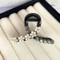 Detailed shot of sparkling rhinestone camellia hair claw, elegant black hair accessory design. - 6CM Hanger Style / Black