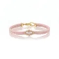 Roze gevlochten armband met gouden metalen hardware en een centrale kristallen ster. - Roze Touw Ronde Strass