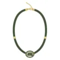 Close-up detail of the green woven cord necklace featuring a large oval cut crystal pendant. - Army Green Rope Oval Zirconia Necklace