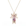 Vue détaillée du collier fleur de naissance de septembre avec élégant nœud et asters violets. - Colliers carte fleur de naissance de septembre