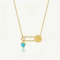 Collier épingle de sûreté plaqué or avec pavé de cristaux, motif floral et pendentif cœur. - Collier fleur épingle de décembre
