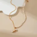 Exquisite minimalist asymmetrical pearl and gold chain necklace with a unique pendant. - Seed Bead Splicing Baroque Bead Style