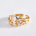 Detailed view of fashionable double layer open ring featuring irregular geometric mixed cut cubic zirconia. - Multi-Geometric Rhinestone Design