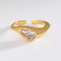 Close-up detail of irregular geometric gold open ring with sparkling teardrop zirconia. - Single Waterdrop Style