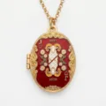Gold-plated oval aries zodiac locket necklace featuring red enamel and playing card motif - Aries