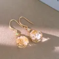 Bohemian resin flower teardrop earrings, delicate gold-tone drop design with dried floral details. - Ear Hooks - Gold - White / White