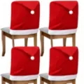 Set di 4 coprisedia natalizi in tessuto non tessuto rosso, design cappello di Babbo Natale - Coprisedie rossi in tessuto non tessuto Set da 4