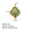 Keramik Muschel Anhänger mit goldenem Edelstahl Öse und Perle, 24mm Höhe, 1.9g Gewicht DIY. - Schalenform (HP0257G24)