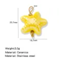 Yellow ceramic star pendant with stainless steel parts, size 20.7x18.7mm, weight 3.0g. - Yellow