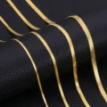 Close-up detail of exquisite 18K gold plated herringbone snake chain necklace for women. - 4.0mm*45cm / Gold
