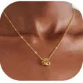 Elegant gold-tone interlocked knot pendant necklace, stylish clavicle chain for women. - Knot Pendant Style (2026-04-N-5661-2) / Gold