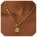 Gold-tone sunburst coin pendant necklace with stylish chain and toggle clasp for women fashion. - Round Sun Pattern Pendant OT Buckle (2026-04-N-5653-3) / Gold