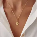 Gold plated paperclip chain necklace with oval star pendant for women fashion daily wear - North Star Relief Pendant Style (2026-04-N-5600) / Gold