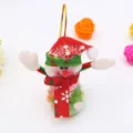 Close-up of cute Christmas snowman ornament with candy jar and colorful candies inside. - Snowman
