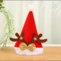 Verdickte rote Weihnachtsmütze mit braunen Rentiergeweihen und goldener Schleife für Partydeko. - Kinder Samt-Rentier-Mütze (Verdickt Braun) 25*34cm