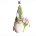 Easter gnome plush toy with bunny ears holding pink flower, cute holiday home decor gift. - Style E
