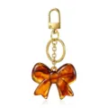 Llavero elegante con lazo de resina efecto carey y gancho de metal dorado para bolso. - Llavero de Mariposa