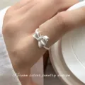 S925 Zilveren Strik Ring Minimalistisch Niche Ontwerp Elegante Vinger Sieraden voor Vrouwen - Verstelbaar Open / Matte Strik Bloem Stijl (K1548)