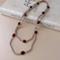 Detailed shot of retro multi-layer beaded necklace featuring chic stones and metal spacers. - 23# Necklace - Gray