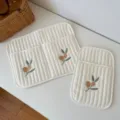 Gesteppte cremefarbene Baby-Aufbewahrungstasche mit Stickerei für Kinderwagen. - Olive