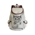 Canvas backpack detail showing cute owl print design, contrast brown trim, and front pocket. - Beige Owl Style (sj1207)