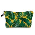 Detail shot of stylish tropical green leaves pattern cosmetic bag with zipper closure. - Monstera Leaf Style (hz4778)