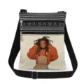 Detailed view of the double zipper canvas crossbody bag with cartoon girl print and black strap. - Black Strap Print Bag (xkk0510)