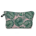 Close-up detail of tropical palm and monstera green leaf print cosmetic bag zipper side. - Pink Green Leaf Style (hz4792)