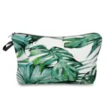 Close-up detail of the tropical green leaf printed cosmetic bag, showcasing pattern texture. - Watercolor Monstera Style (hz4797)