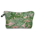 Detailed close-up view of the tropical green leaves pattern makeup pouch zipper feature. - Pink Tropical Leaves Style (hz4800)