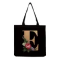 Black canvas tote bag with gold letter E and vintage floral print, casual shopping bag. - Letter E Print (hm3183)
