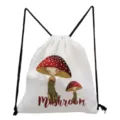 Close-up detail of the white drawstring bag featuring a cute red mushroom print design. - White Background Personified Mushroom (sk0839)