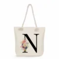 Stofftasche mit Blumenbuchstaben Druck und Kordelgriffen für Strand Einkäufe und Alltag. - Buchstabe N (ms2471)
