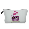 Close-up detail of the cute owl printed cosmetic storage bag featuring sweet heart patterns. - Purple Owl Family Style (hz571g)