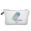 Detailed view of white cosmetic pouch with blue owl print and zipper closure. - White Background Blue Owl (hz1210)