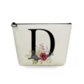 Bolsa de maquillaje de lona con letra D negra y estampado floral, elegante neceser cosmético. - Estilo Letra D