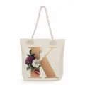 Canvas tote bag with elegant gold letter K print and vintage floral pattern for daily use. - Golden Letter K Print Style