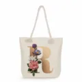 Canvas tote bag with gold letter R and floral print, stylish and large capacity shoulder bag. - Golden Letter R Print Style