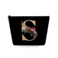 Zwarte cosmetische tas met gouden letter S en bloemenprint, draagbare kleine make-up opbergtas. - Hoofdletter S Stijl