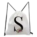 Minimalist white drawstring backpack with custom letter S and floral print for everyday use. - Letter S