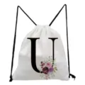 Minimalist white drawstring backpack featuring a chic letter U and floral print design. - Letter U Style
