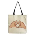 Canvas tote bag with heart hands print, casual reusable shoulder bag for daily shopping. - Single Gesture Heart Print(hm3357)