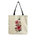 Close-up view of the canvas tote bag featuring a delicate watercolor floral and butterfly print. - Hibiscus Butterfly Watercolor Print(hm3360)