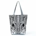 Detailed view of the black and white symmetrical zebra pattern canvas tote bag, spacious design. - Symmetrical Zebra Stripe (hl2700)
