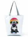 Close-up view of the cute pug graphic printed on the white canvas tote bag with grey straps. - Sunglasses Beach Sunset Pug Print Style (hl4452)