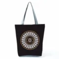 Black canvas tote bag with unique eye graphic print, casual shoulder bag for daily use. - Geometric Sun Eye (hl2715)