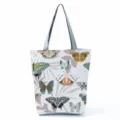 Large capacity casual canvas tote bag featuring a stylish butterfly and leaf print design. - Multicolor Butterfly Leaves (hl2719)